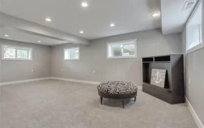 Finished basement family room with recessed lighting